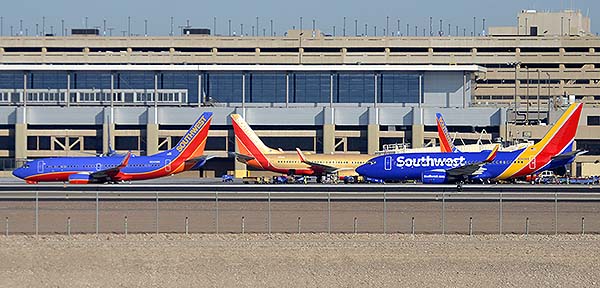 Southwest Boeing 737-7H4s N244WN and N711HK and 737-790 N560WN, Phoenix Sky Harbor, December 22, 2014